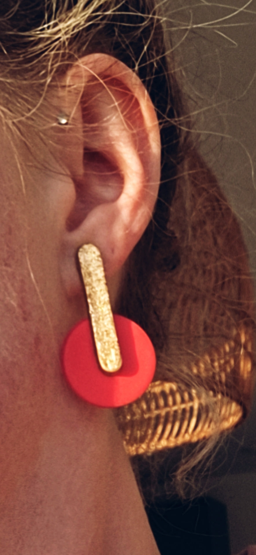 " ciara"in textures gold and coral.